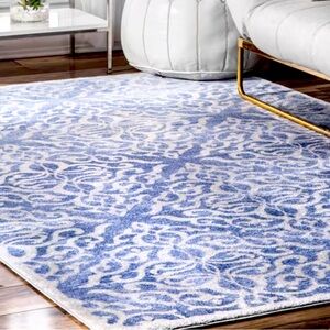Blue and white still in the package never opened 4*6 rug